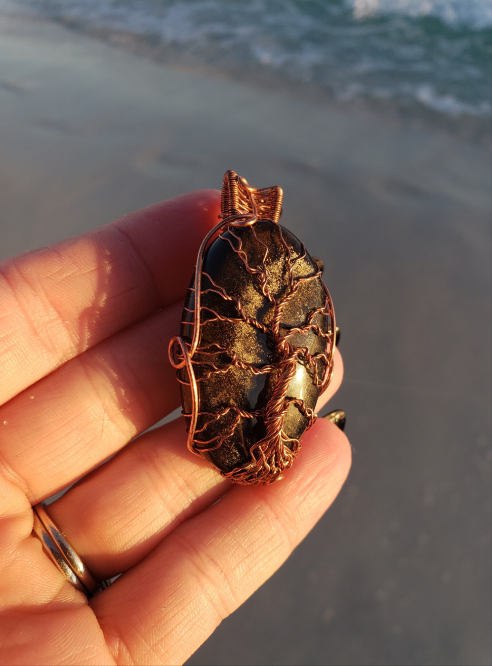 Lovely Tree of Life wire wrapped pendant. Gold Sheen Obsidian Comes On leather cord. Handmade. Wire wraps. Copper wire