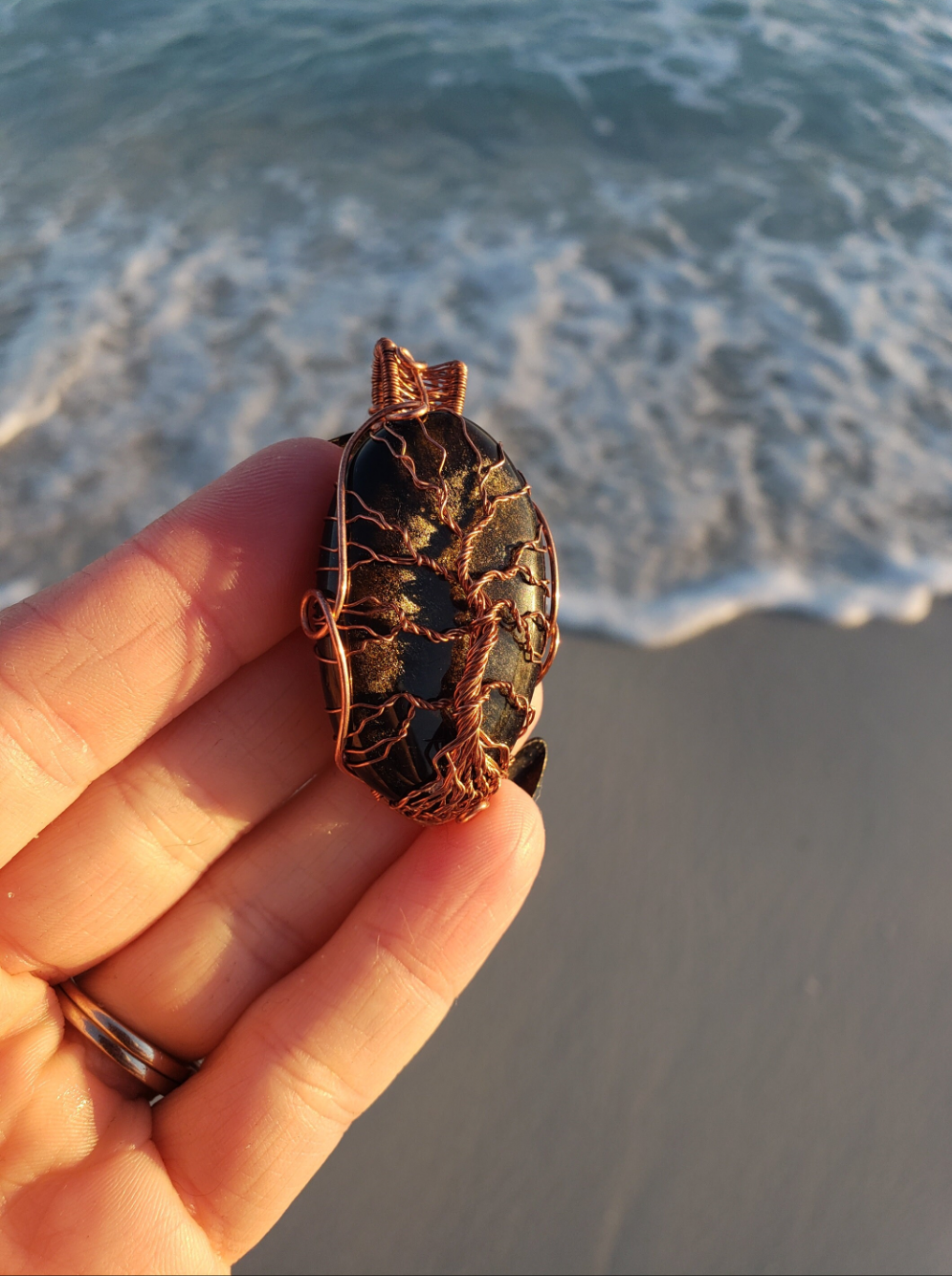Lovely Tree of Life wire wrapped pendant. Gold Sheen Obsidian Comes On leather cord. Handmade. Wire wraps. Copper wire
