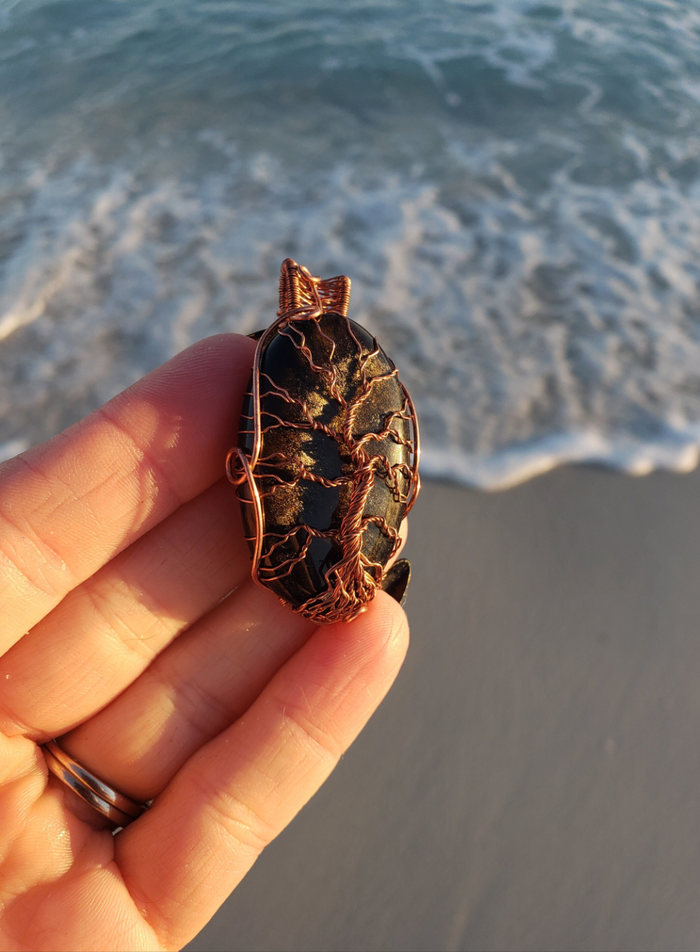 Lovely Tree of Life wire wrapped pendant. Gold Sheen Obsidian Comes On leather cord. Handmade. Wire wraps. Copper wire