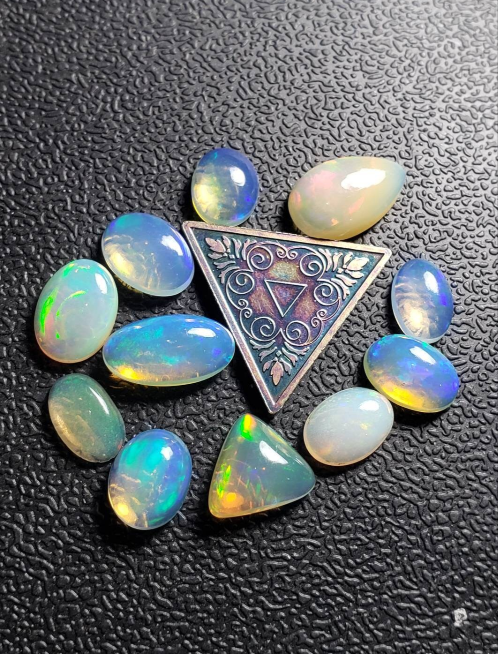 Lot of small assorted Ethiopian Welo Opal Cabochons. Oval,tear drop,trillion. 6mm -11mm. 10 carats. Accents. Jewelry making supplies. Ring sized.