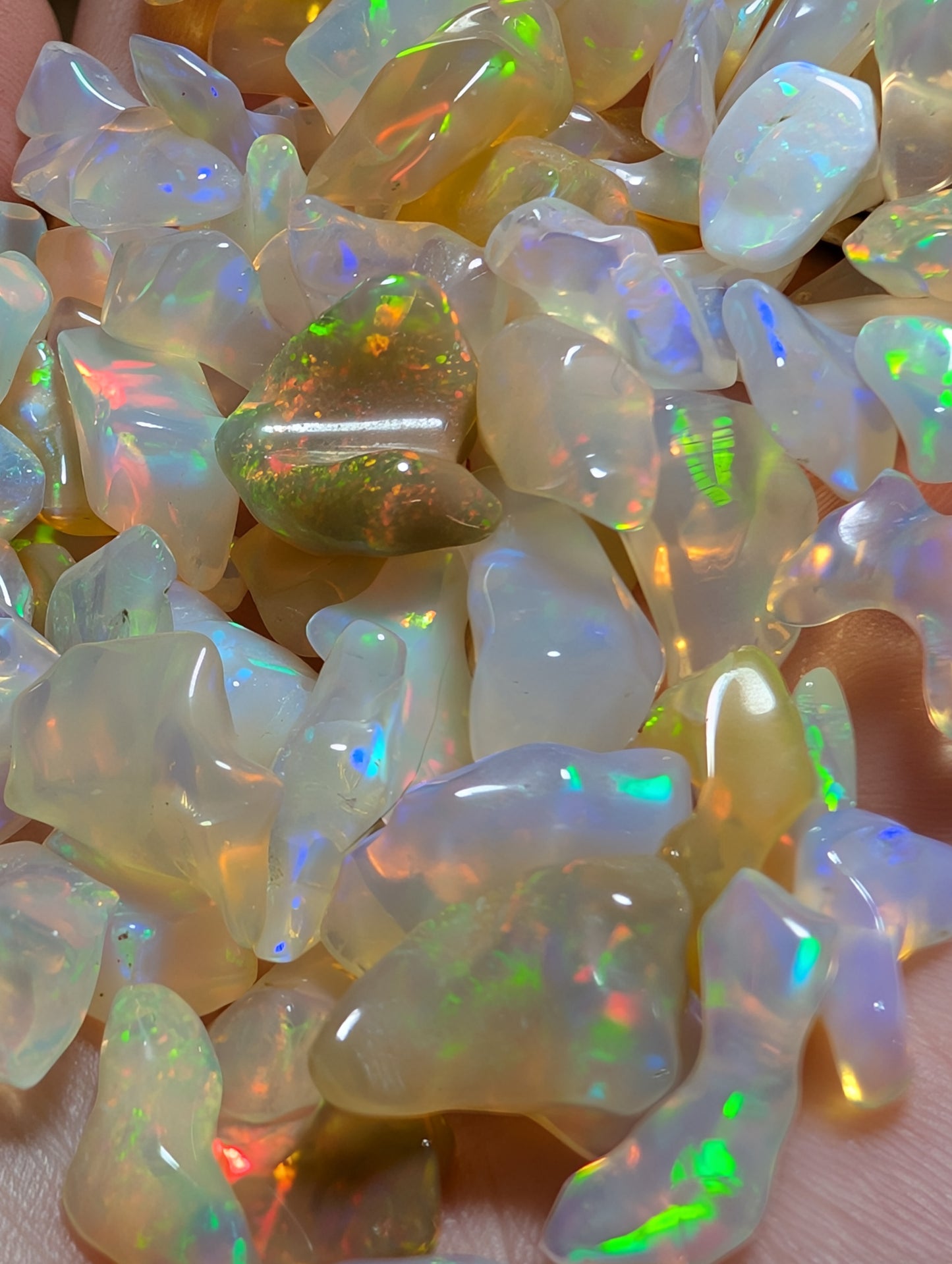 Lot of freeform Ethiopian Welo Opals. Tumbled chunks. 8 -16mm. 10 carats. Accents. Jewelry making supplies. Random grab lots.