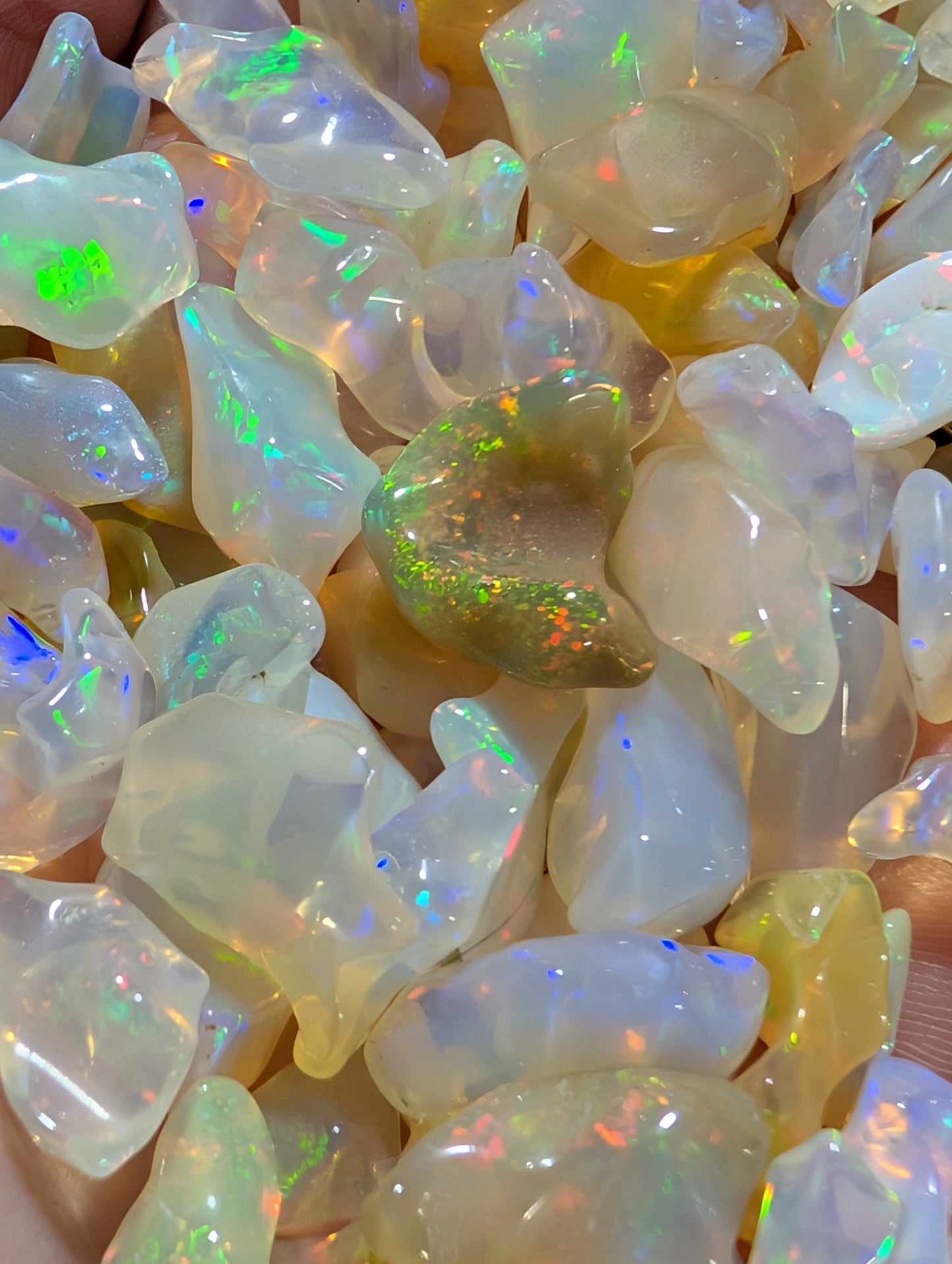 Lot of freeform Ethiopian Welo Opals. Tumbled chunks. 8 -16mm. 20 carats. Accents. Jewelry making supplies. Random grab lots.