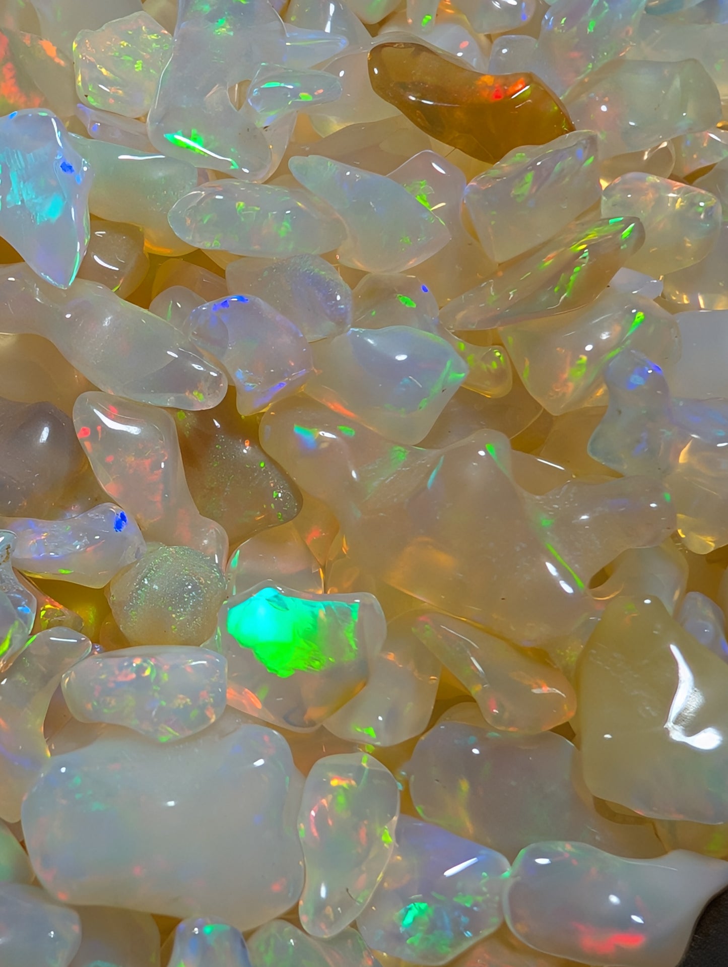 Lot of freeform Ethiopian Welo Opals. Tumbled chunks. 8 -16mm. 20 carats. Accents. Jewelry making supplies. Random grab lots.