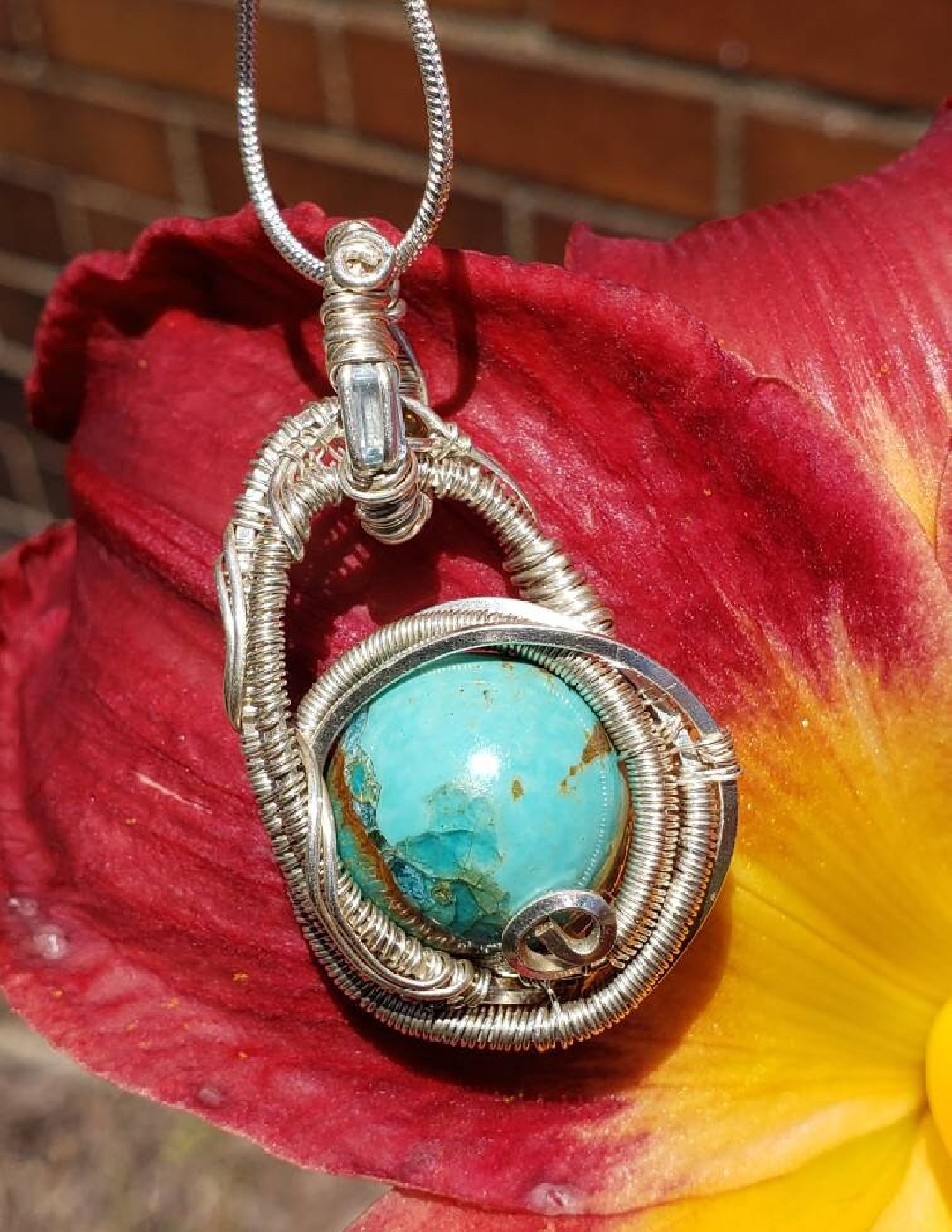 Stunning Wire wrapped Swinging pendant. Sterling silver Wire wrapped around a Turquoise cabochon. Aquamarine tourmaline Pendants. Heady.