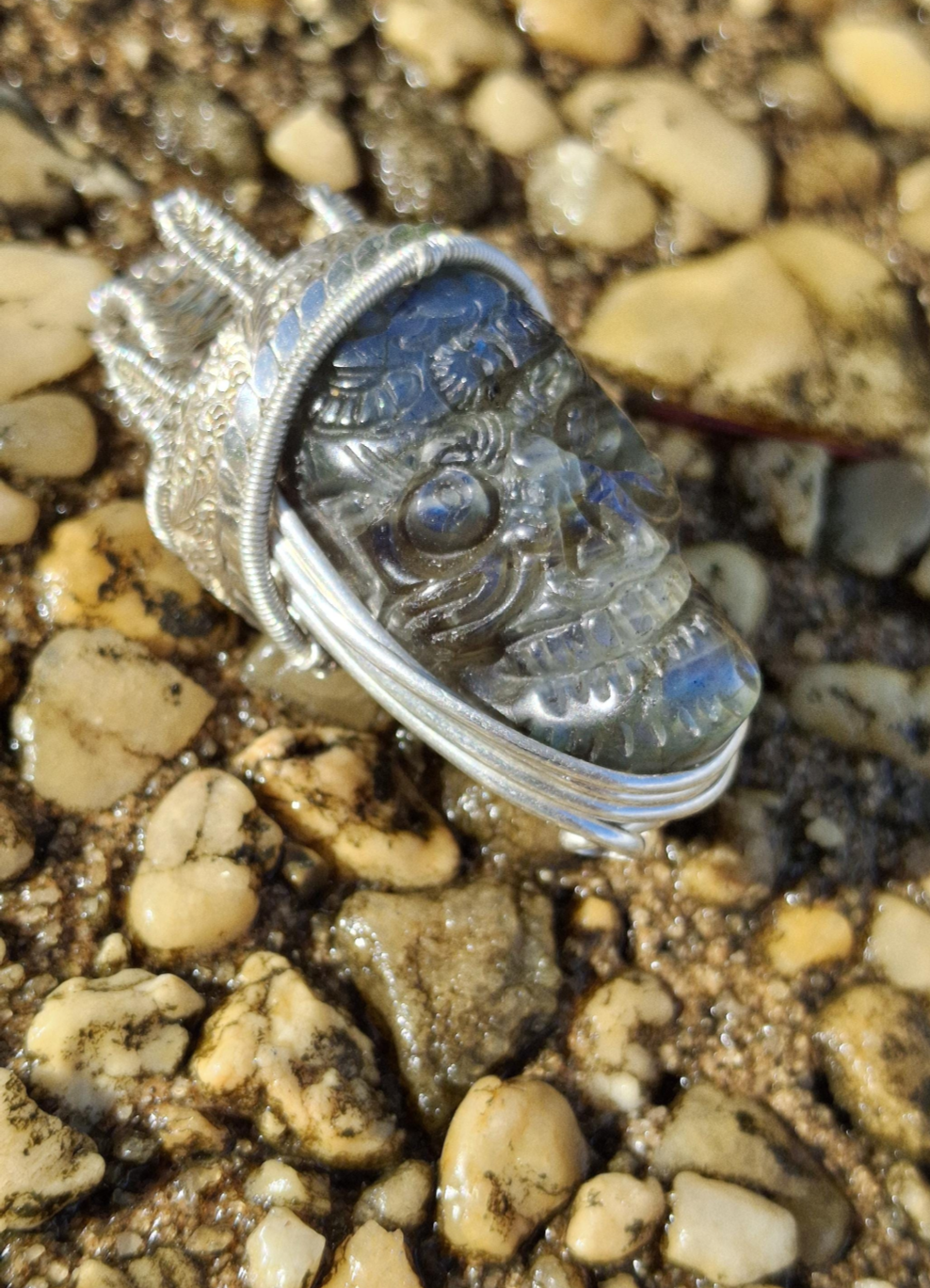 Stunning Wire wrapped pendant. Sterling silver Wire wrapped around a labradorite carved skull cabochon. Pendants. Heady. Gifts.