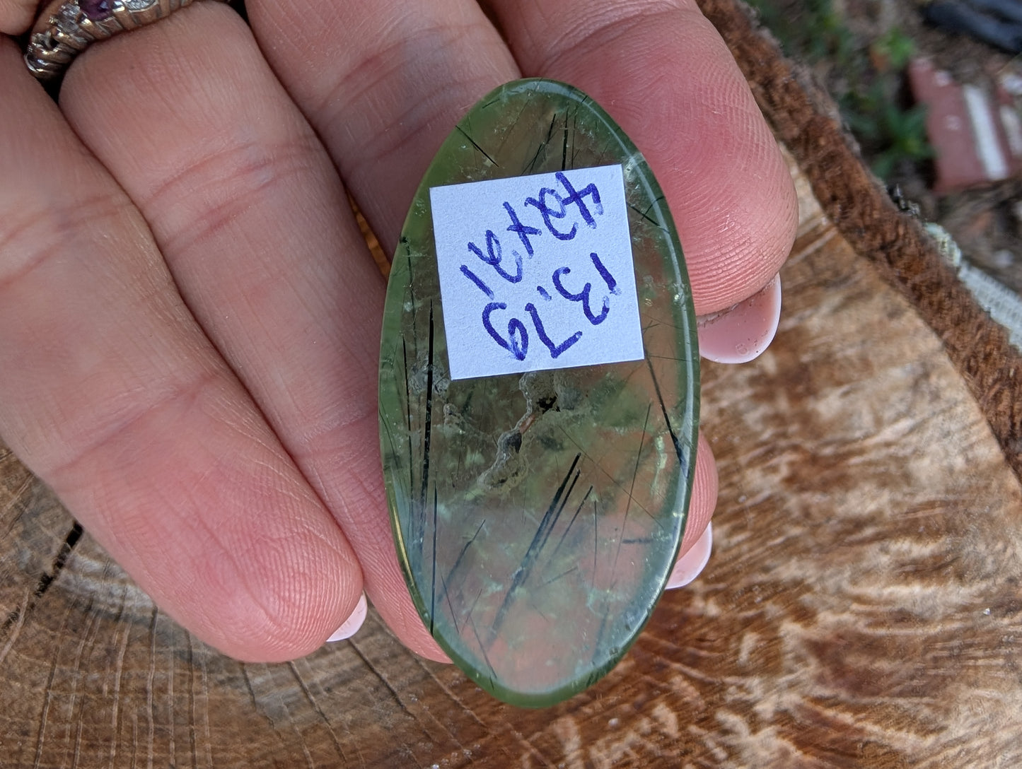 Phrenite cabochon with natural cavity. Oval . Green 42mm x 21mm