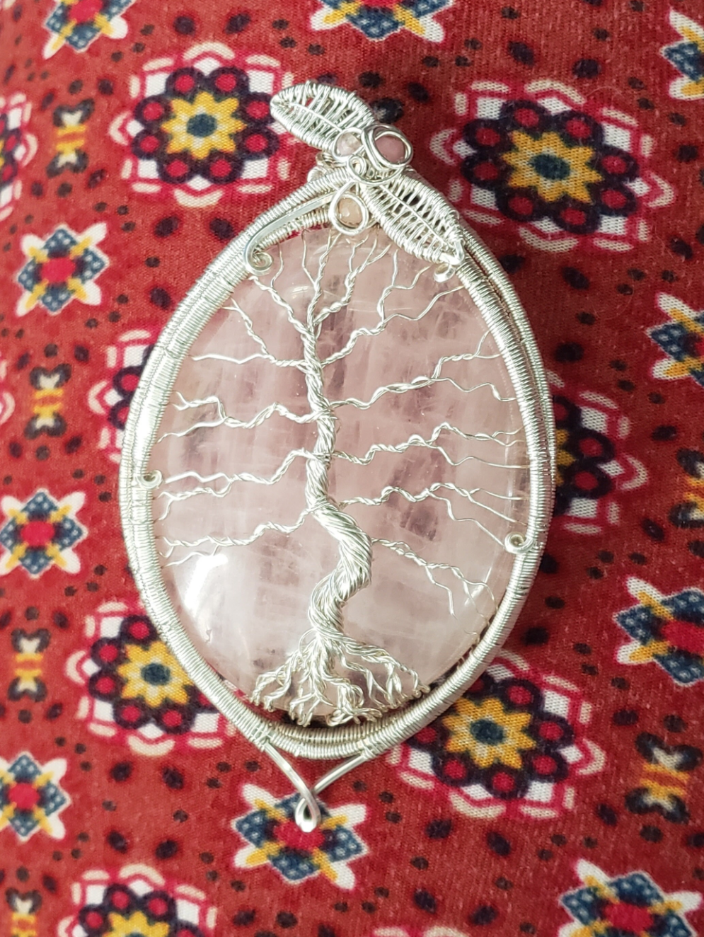 Sterling Silver wire wrapped Tree of life on a lovley pink rose quartz and rhodonite accents Handmade. Wire wraps. Pendants.