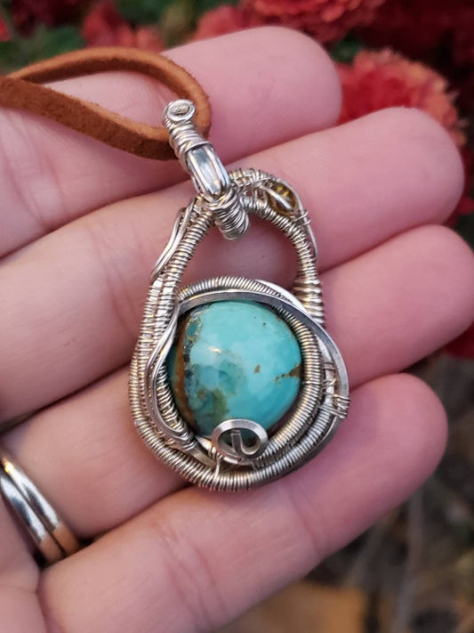 Stunning Wire wrapped Swinging pendant. Sterling silver Wire wrapped around a Turquoise cabochon. Aquamarine tourmaline Pendants. Heady.