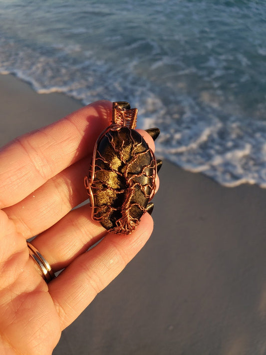 Lovely Tree of Life wire wrapped pendant. Gold Sheen Obsidian Comes On leather cord. Handmade. Wire wraps. Copper wire