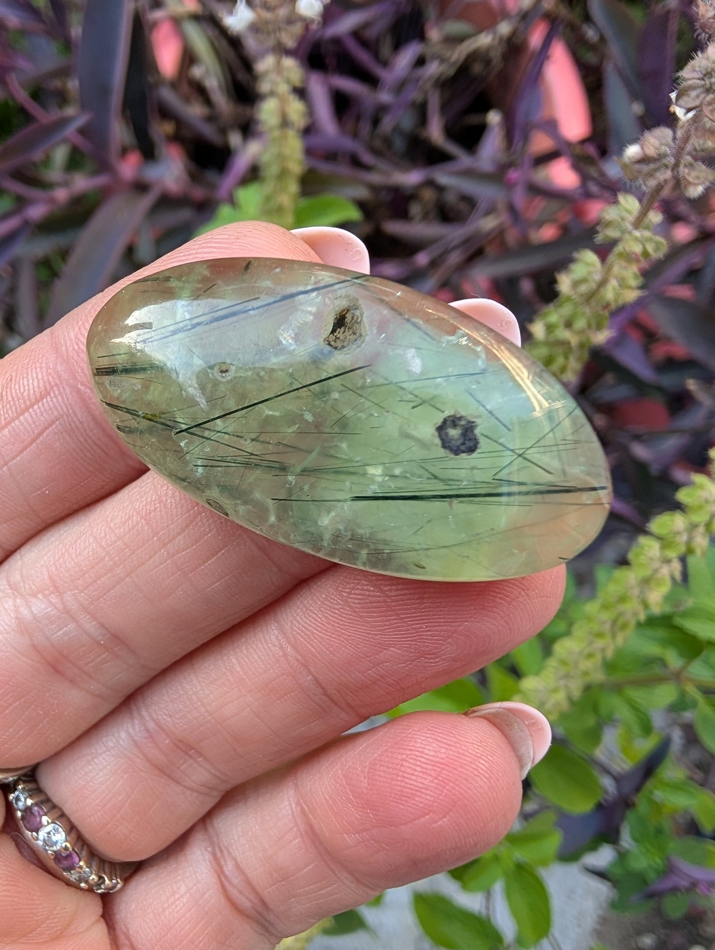 Phrenite cabochon with natural cavity. Oval . Green 42mm x 21mm