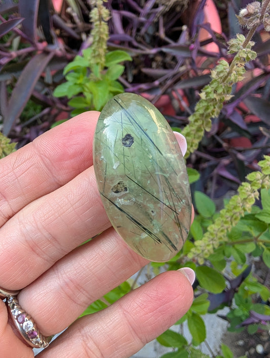 Phrenite cabochon with natural cavity. Oval . Green 42mm x 21mm