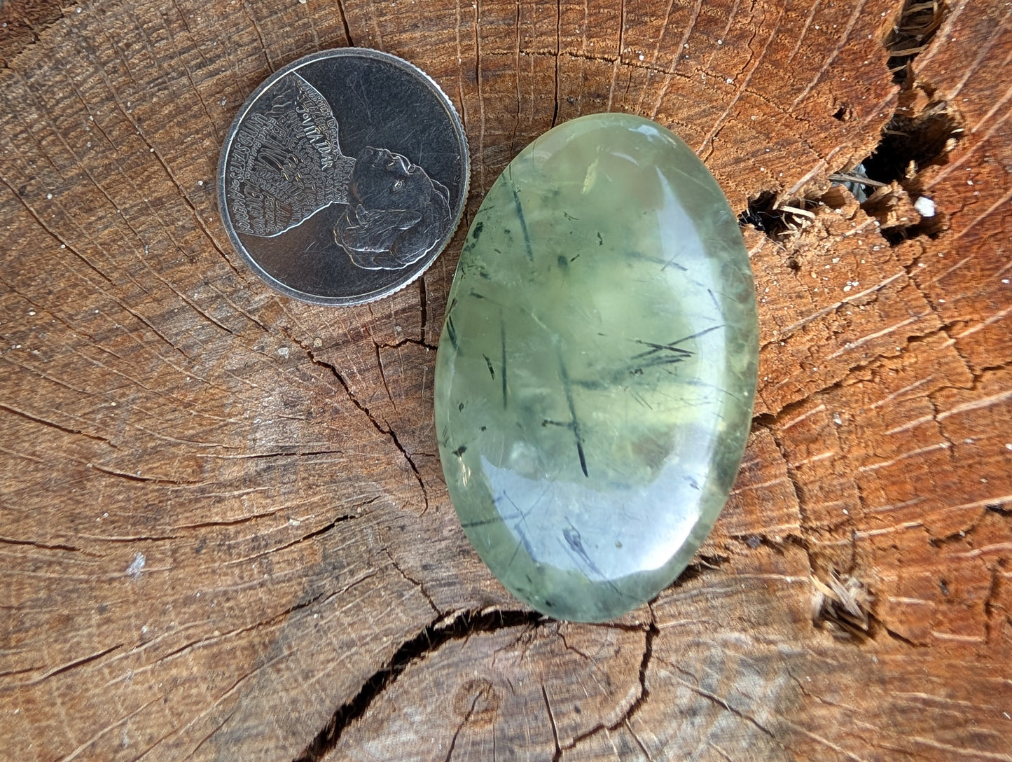 Phrenite cabochon. Oval . Green 40.5mm x 20mm