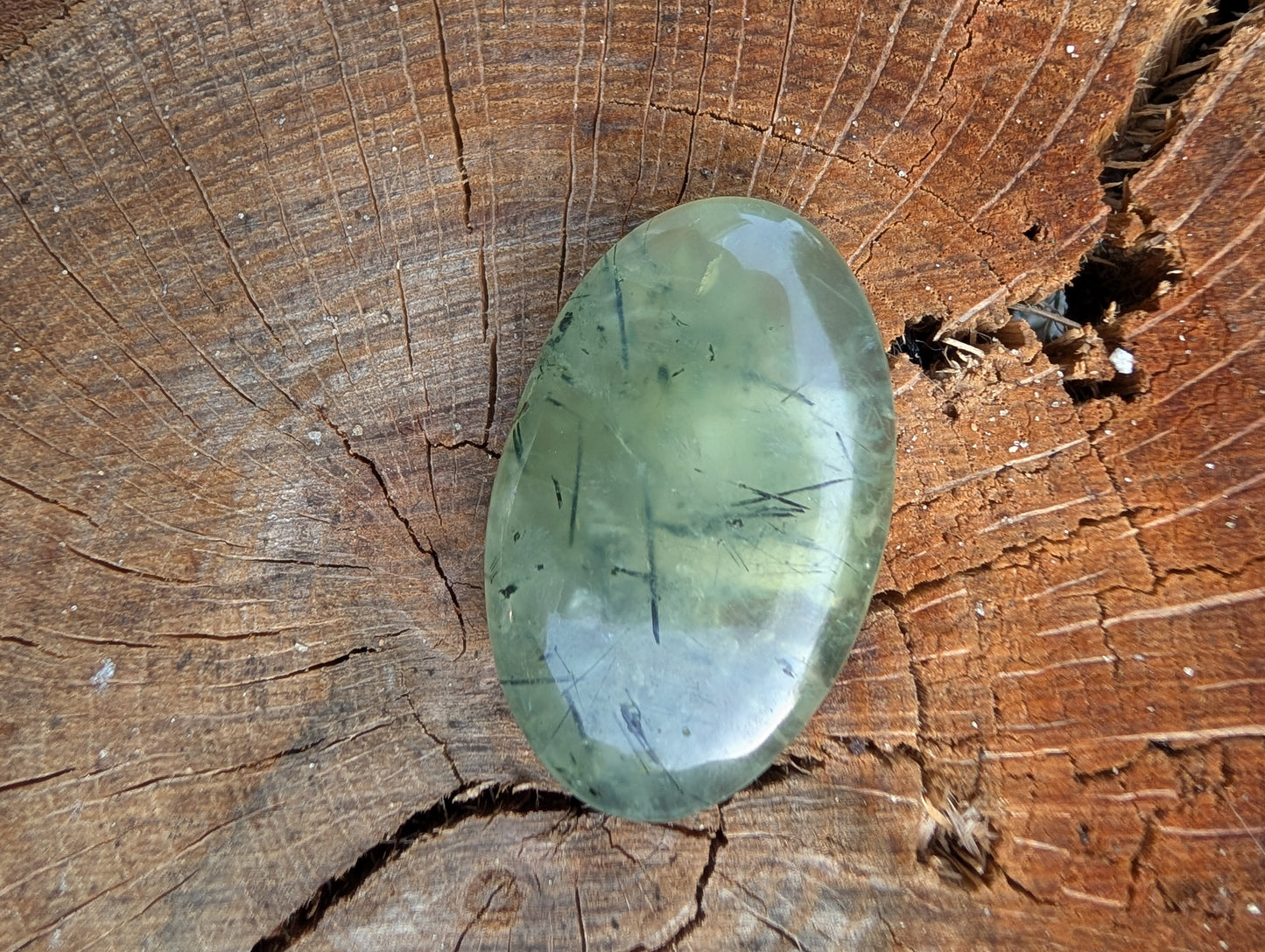 Phrenite cabochon. Oval . Green 40.5mm x 20mm
