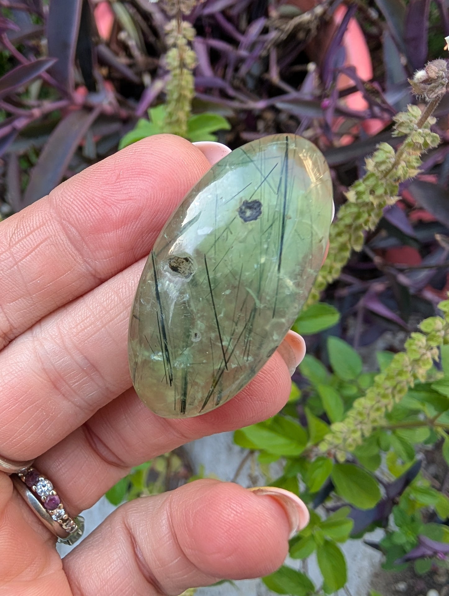 Phrenite cabochon with natural cavity. Oval . Green 42mm x 21mm